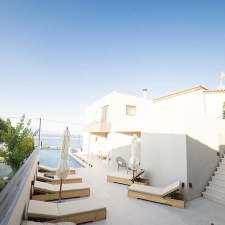 Theros Suites Dhiminio Екстериор снимка